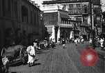 Immagine di Strada trafficata in una città India, 1953, secondo 28 filmato di repertorio 65675028598