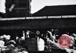 Standbild Dhobis arbeiten an einer Dhobi Ghat Indien, 1953, aus Sekunde 21 historischem Filmmaterial Videoclip 65675028601