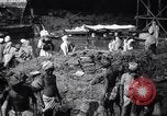 Image of Men digging clay from a river bank India, 1953, second 6 stock footage video 65675028607