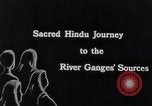 Image of Hindu Pilgrims traveling to the Kedarnath Mandir Temple India, 1939, second 28 stock footage video 65675028613