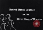 Image of Hindu Pilgrims traveling to the Kedarnath Mandir Temple India, 1939, second 30 stock footage video 65675028613