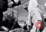 Image of Hindus pilgrims travel to the temple of the Kedarnath India, 1939, second 31 stock footage video 65675028614