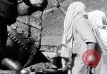Image of Hindus pilgrims travel to the temple of the Kedarnath India, 1939, second 32 stock footage video 65675028614