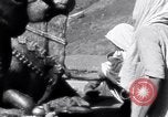 Image of Hindus pilgrims travel to the temple of the Kedarnath India, 1939, second 33 stock footage video 65675028614
