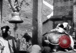 Image of Hindus pilgrims travel to the temple of the Kedarnath India, 1939, second 41 stock footage video 65675028614