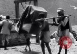 Image of Hindus pilgrims travel to the temple of the Kedarnath India, 1939, second 49 stock footage video 65675028614