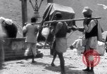Image of Hindus pilgrims travel to the temple of the Kedarnath India, 1939, second 50 stock footage video 65675028614
