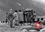 Image of Hindus pilgrims travel to the temple of the Kedarnath India, 1939, second 58 stock footage video 65675028614