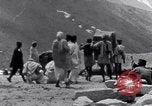 Image of Hindus pilgrims travel to the temple of the Kedarnath India, 1939, second 59 stock footage video 65675028614