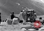 Image of Hindus pilgrims travel to the temple of the Kedarnath India, 1939, second 60 stock footage video 65675028614