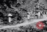 Image of Hindu pilgrims journeying to the soutce of the Ganges River India, 1939, second 31 stock footage video 65675028616