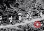 Image of Hindu pilgrims journeying to the soutce of the Ganges River India, 1939, second 33 stock footage video 65675028616