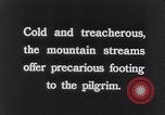 Image of Hindu pilgrims bathe while on journey to Ganges river source India, 1939, second 35 stock footage video 65675028617