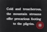 Image of Hindu pilgrims bathe while on journey to Ganges river source India, 1939, second 39 stock footage video 65675028617