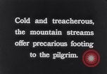 Image of Hindu pilgrims bathe while on journey to Ganges river source India, 1939, second 40 stock footage video 65675028617