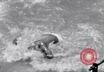 Image of Hindu pilgrims bathe while on journey to Ganges river source India, 1939, second 57 stock footage video 65675028617