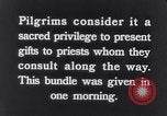 Image of Hindu pilgrims giving gifts to priests during their pilgrimage India, 1939, second 13 stock footage video 65675028618