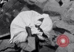 Image of Hindu pilgrims giving gifts to priests during their pilgrimage India, 1939, second 18 stock footage video 65675028618