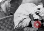 Image of Hindu pilgrims giving gifts to priests during their pilgrimage India, 1939, second 21 stock footage video 65675028618