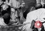Image of Hindu pilgrims giving gifts to priests during their pilgrimage India, 1939, second 25 stock footage video 65675028618