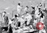 Image of Hindu pilgrims giving gifts to priests during their pilgrimage India, 1939, second 28 stock footage video 65675028618