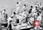 Image of Hindu pilgrims giving gifts to priests during their pilgrimage India, 1939, second 31 stock footage video 65675028618