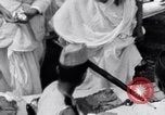 Image of Hindu pilgrims giving gifts to priests during their pilgrimage India, 1939, second 41 stock footage video 65675028618