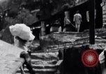 Image of Hindu pilgrims giving gifts to priests during their pilgrimage India, 1939, second 44 stock footage video 65675028618