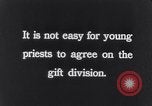 Image of Hindu pilgrims giving gifts to priests during their pilgrimage India, 1939, second 51 stock footage video 65675028618