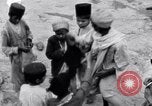 Image of Hindu pilgrims giving gifts to priests during their pilgrimage India, 1939, second 57 stock footage video 65675028618