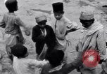 Image of Hindu pilgrims giving gifts to priests during their pilgrimage India, 1939, second 58 stock footage video 65675028618