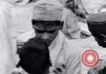 Image of Hindu pilgrims giving gifts to priests during their pilgrimage India, 1939, second 60 stock footage video 65675028618