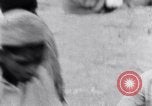 Image of Hindu pilgrims giving gifts to priests during their pilgrimage India, 1939, second 61 stock footage video 65675028618