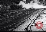 Image of logging operation in America early 1900s United States USA, 1910, second 3 stock footage video 65675028624