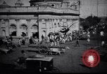Image of Approach to the Old Howrah  bridge  Calcutta India, 1915, second 4 stock footage video 65675028626