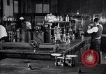 Image of Experiments in distillation laboratory United States USA, 1924, second 27 stock footage video 65675028671