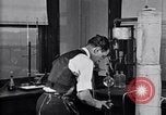 Image of Experiments in distillation laboratory United States USA, 1924, second 30 stock footage video 65675028671