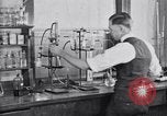 Image of Experiments in distillation laboratory United States USA, 1924, second 34 stock footage video 65675028671