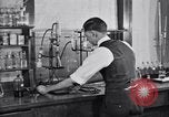 Image of Experiments in distillation laboratory United States USA, 1924, second 36 stock footage video 65675028671