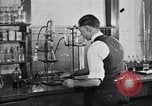 Image of Experiments in distillation laboratory United States USA, 1924, second 37 stock footage video 65675028671