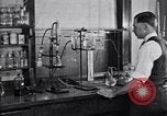 Image of Experiments in distillation laboratory United States USA, 1924, second 38 stock footage video 65675028671