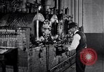 Image of Experiments in distillation laboratory United States USA, 1924, second 49 stock footage video 65675028671