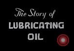 Image of lubricating oil Indiana United States USA, 1926, second 31 stock footage video 65675028674