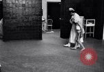 Immagine di Crippled bambino con un infermiere United States USA, 1920, secondo 42 filmato di repertorio 65675028690