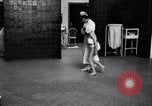 Immagine di Crippled bambino con un infermiere United States USA, 1920, secondo 43 filmato di repertorio 65675028690