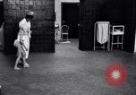 Immagine di Crippled bambino con un infermiere United States USA, 1920, secondo 49 filmato di repertorio 65675028690