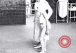 Immagine di Crippled bambino con un infermiere United States USA, 1920, secondo 57 filmato di repertorio 65675028690