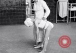 Immagine di Crippled bambino con un infermiere United States USA, 1920, secondo 61 filmato di repertorio 65675028690