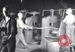 Image of industrial workers at ingot-furnace United States USA, 1920, second 4 stock footage video 65675028691