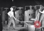 Image of industrial workers at ingot-furnace United States USA, 1920, second 5 stock footage video 65675028691